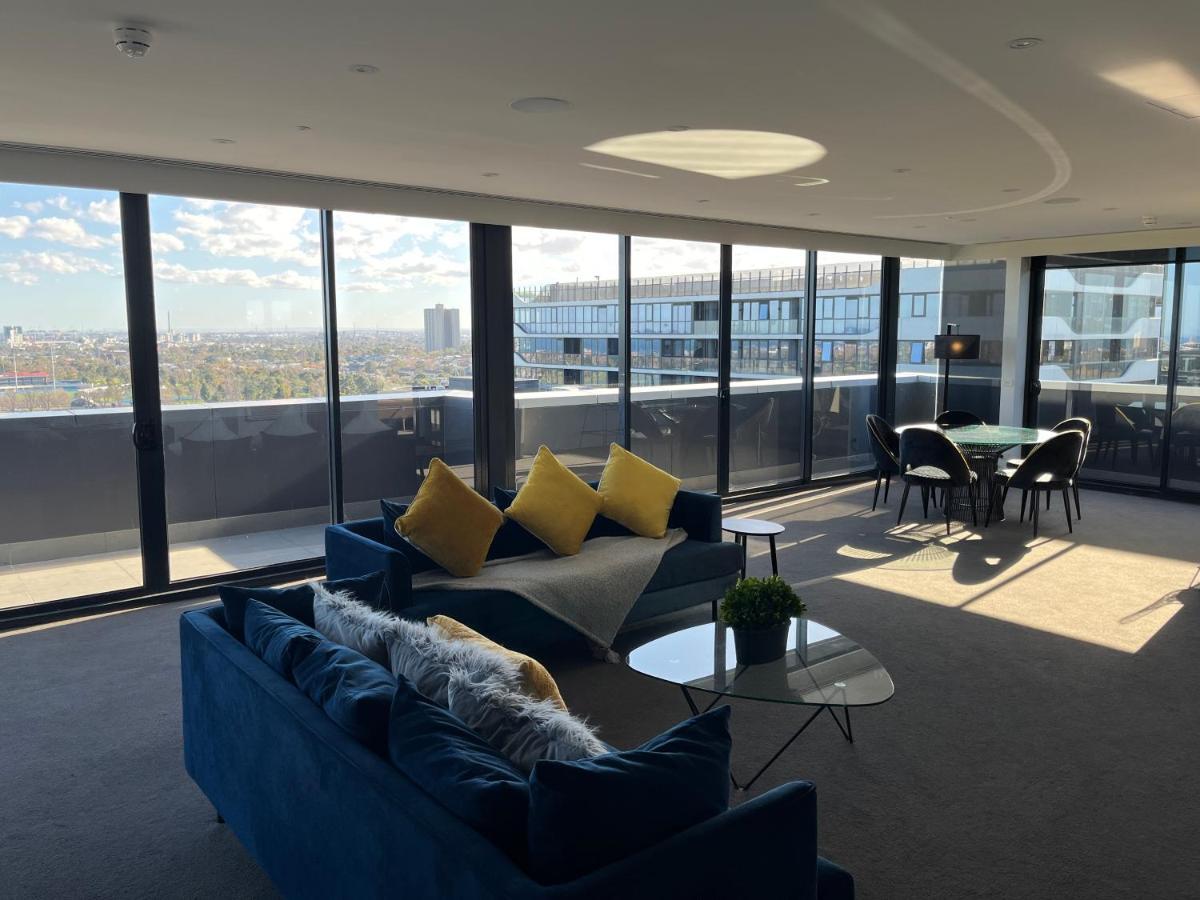The Kinson Hotel Melbourne Exterior photo The living room of a three-bedroom apartment